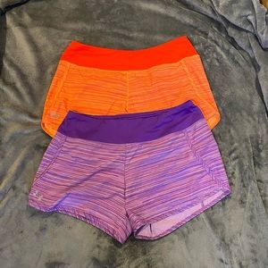 Under Armour Women’s Medium Purple orange lot of 2